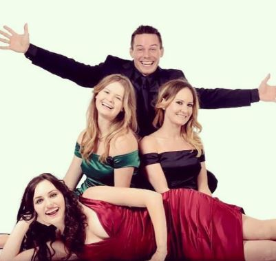 Four kids of Kitty Toombs and Roddy Piper